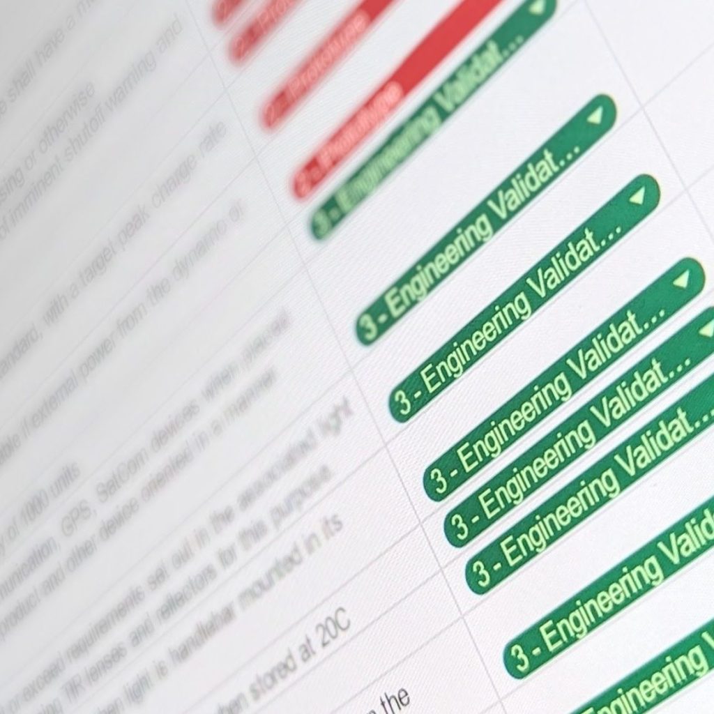 Banner Image showing a spreadsheet with product requirement listings, taken with extreme dutch angle and blue